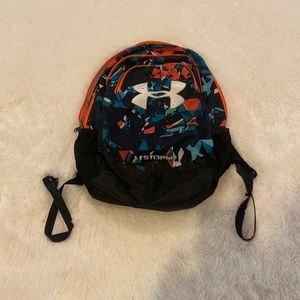Gently used under armor backpack. Smoke free home. All the sippers work.